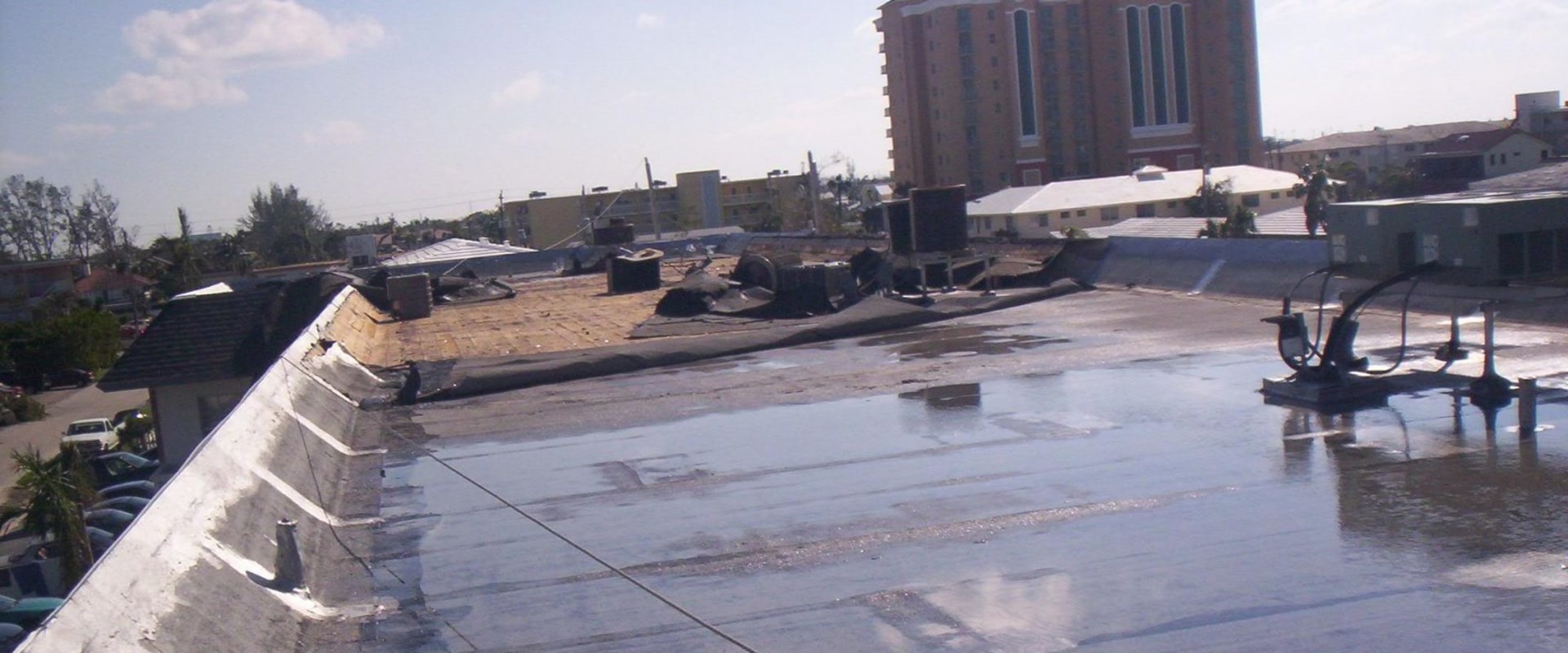 Damage to Commercial Roofs: Understanding the Causes and Solutions